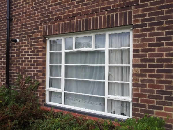 white metal frame windows