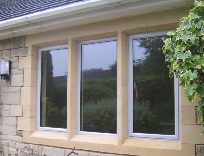 Photo of AG210: A+10 Metal Windows with white frame.